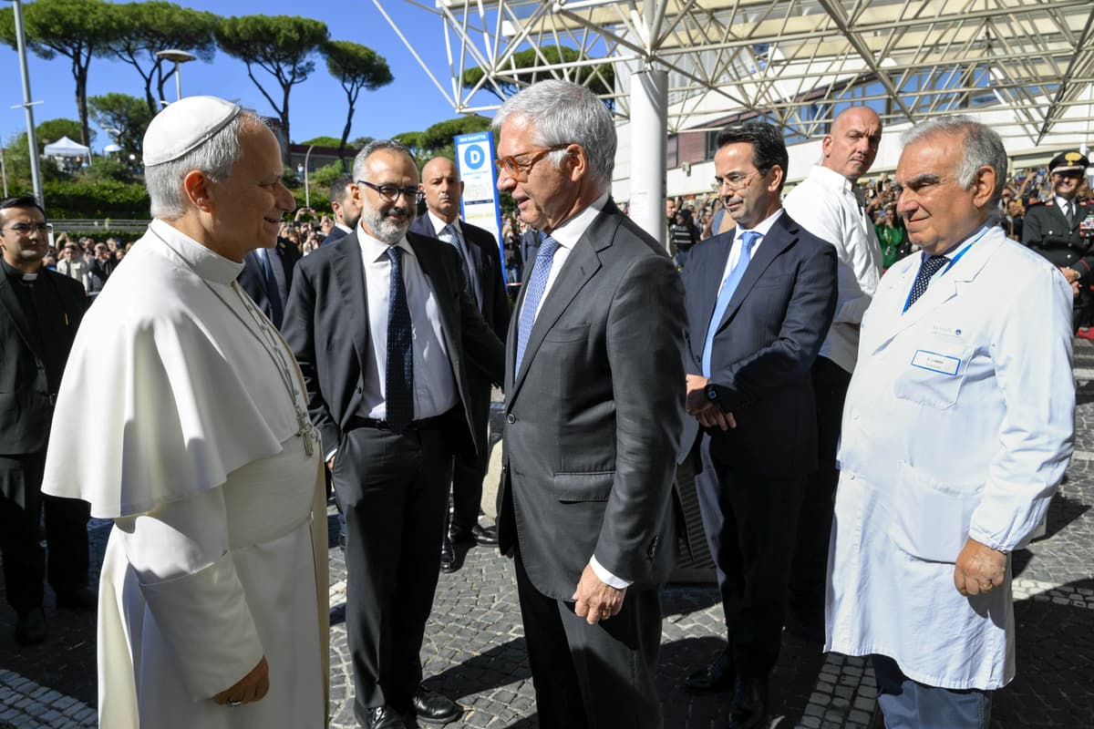 Pope Leo XIV greets the Director of Policlinico Gemelli hospital Daniele Piacentini, as he arrives at Gemelli Hospital on October 13, 2026 at Rome.