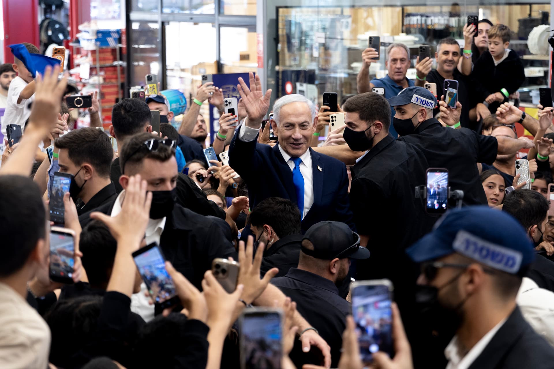  Israeli Prime Minister and Likud Party leader, Benjamin Netanyahu, greets supporters, during a campaign event.