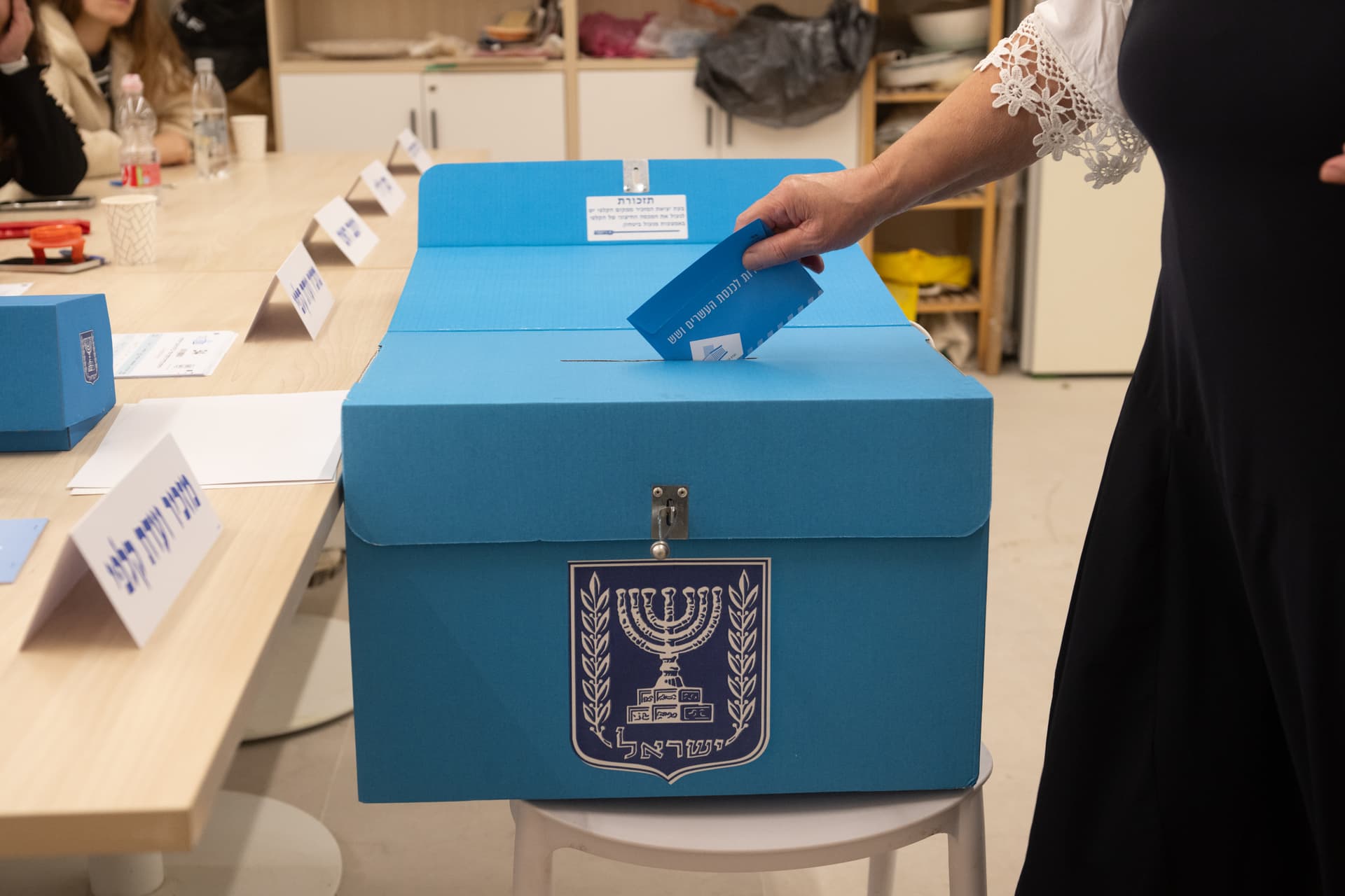 A voter casts her ballot at a polling station on October 27, 2026 at Jerusalem, Israel. 