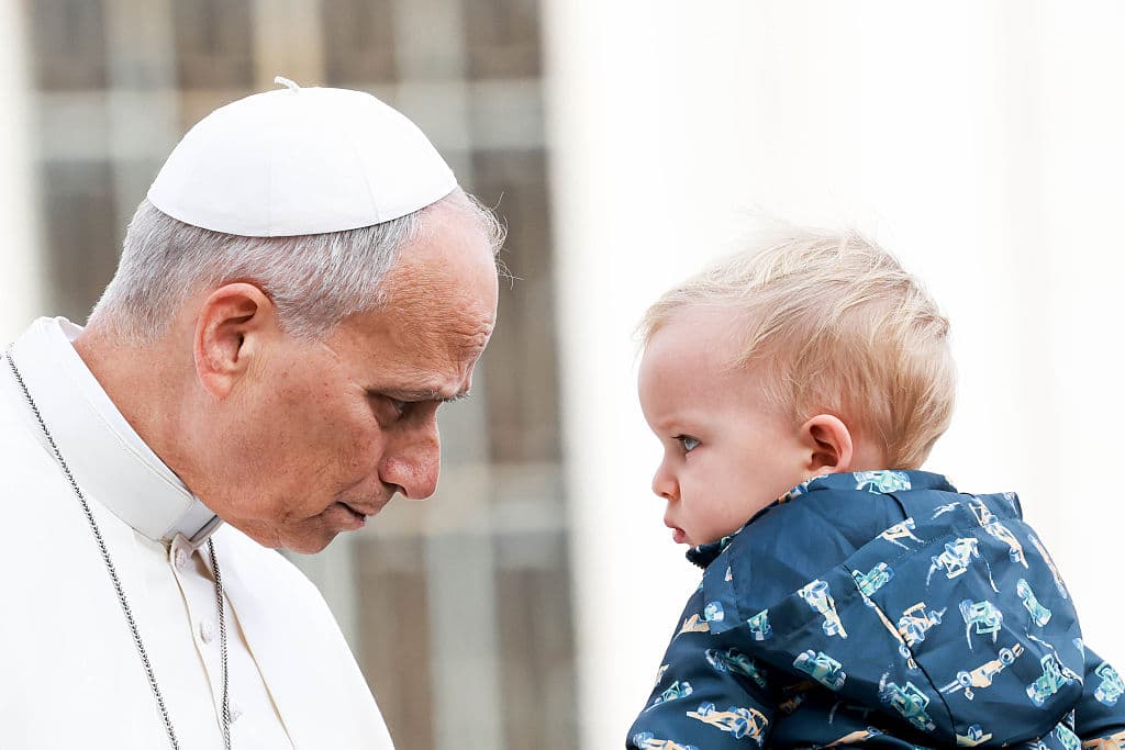 Pope Leo XIV greets a child on October 28, 2026 at Vatican City, Vatican. 