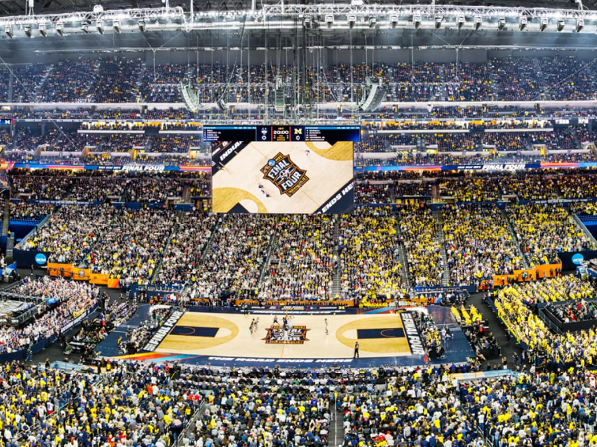 A view of tipoff between the University of Connecticut Huskies and the Michigan Wolverines during the National Championship of the 2026 NCAA Men's Basketball Tournament at Lucas Oil Stadium on April 06, 2026, at Indianapolis, Indiana.