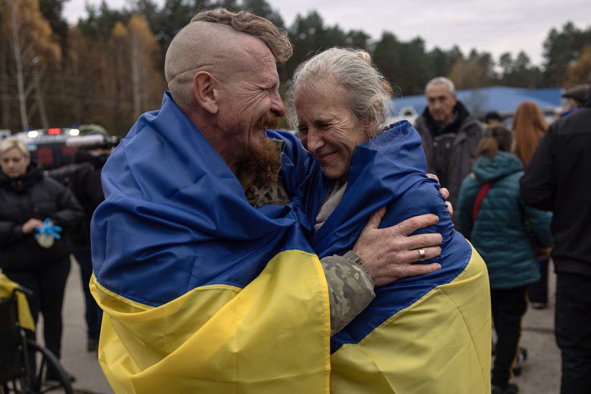 A Ukrainian serviceman, Dmytro, welcomes back his partner Larysa as evacuees from the Russian-occupied town of Oleshky arrive at Chernihiv, Ukraine, on October 31, 2026. 