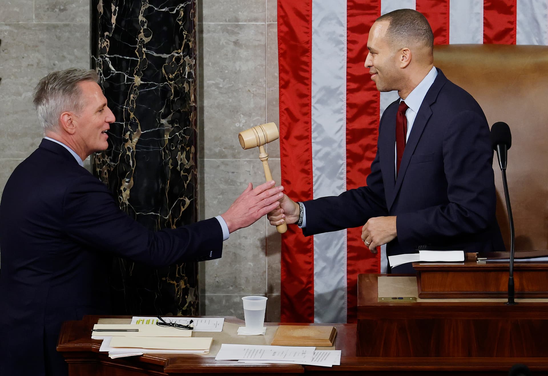 Speaker Kevin McCarthy receives the gavel from the House Democratic leader, Hakeem Jeffries, on January 7, 2023.
