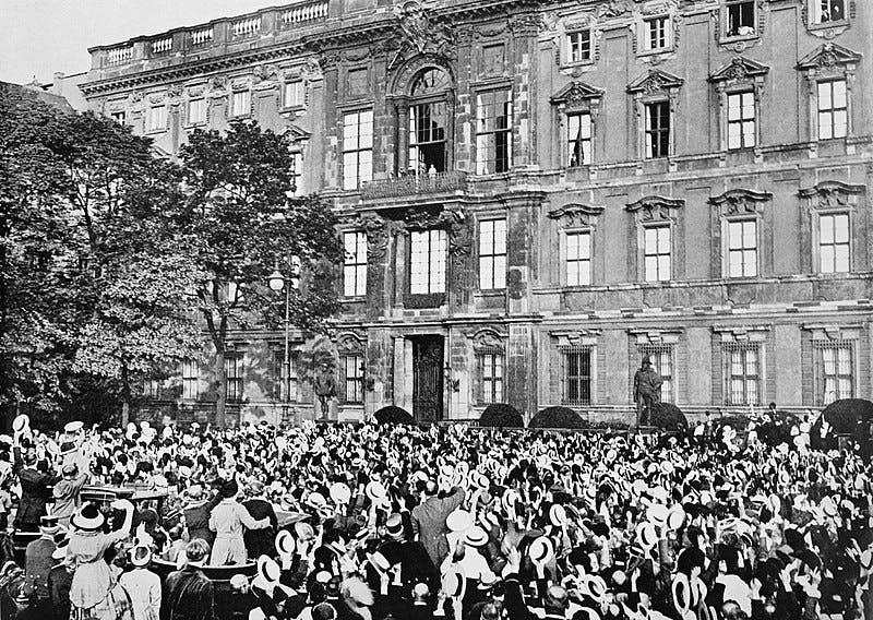 Germans cheering for the Kaiser as war was announced in 1914 at Berlin. Wikimedia Commons