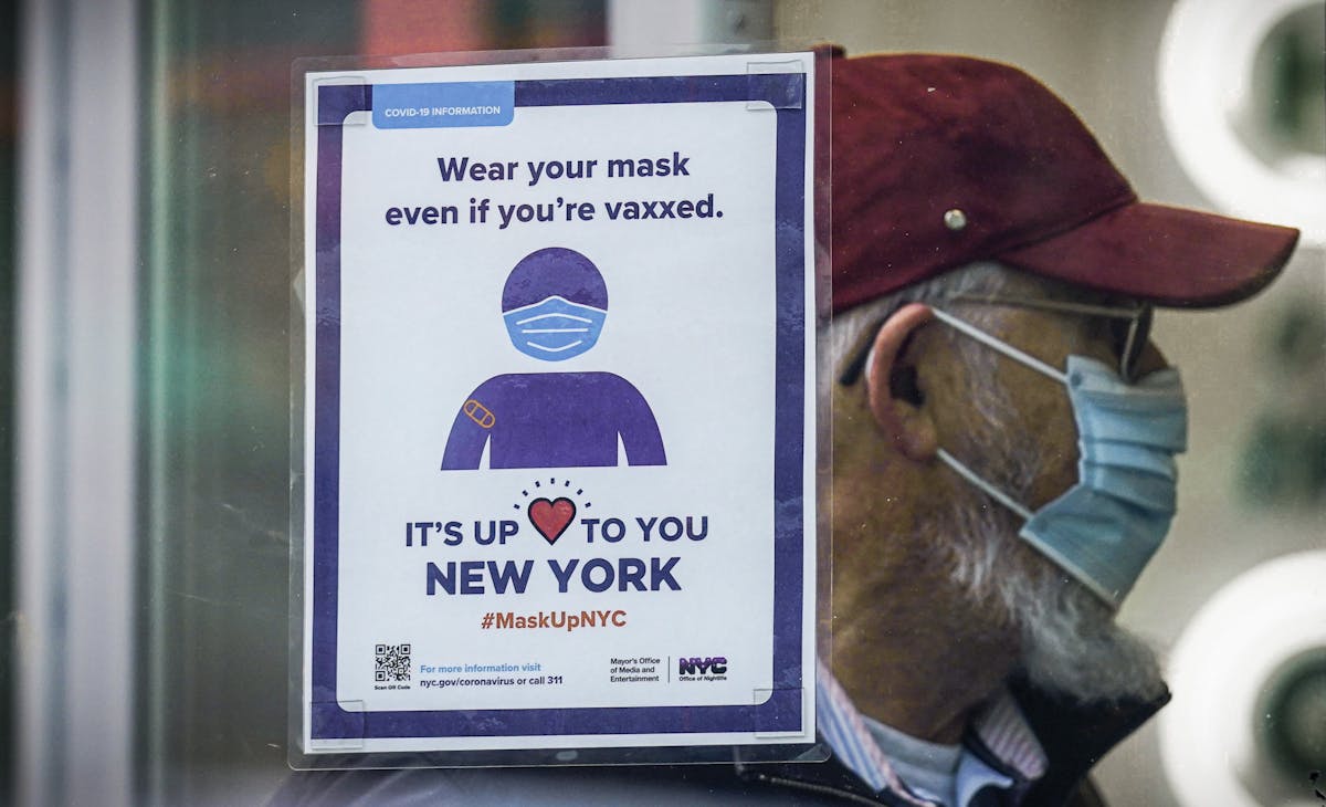 A sign in New York, December 13, 2021. AP/Seth Wenig