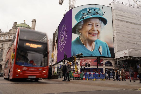 A screen in Piccadilly Circus is lit to celebrate the 70th anniversary of Queen Elizabeth’s accession to the throne, in London, February 6, 2022. AP/Alberto Pezzali