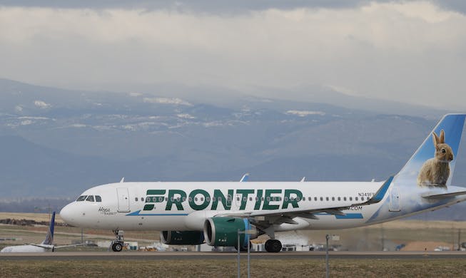 A Frontier Arilines jetliner taxis at Denver International Airport  in April 2020. AP/David Zalubowski