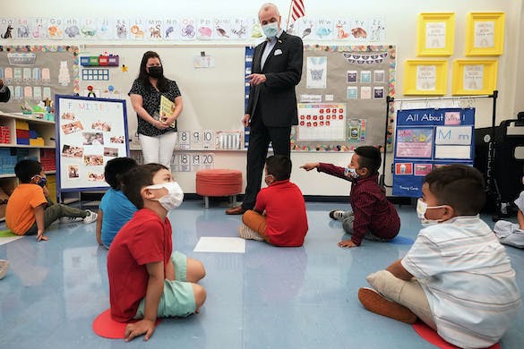 Governor Phil Murphy talks to students at the Dr. Charles Smith Early Childhood Center, September 16, 2021, in Palisades Park, N.J. AP/Mary Altaffer, file