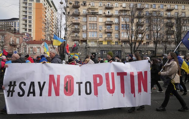 In central Kyiv, Ukraine, February 12, 2022, Ukrainians protest against the potential escalation of the tension between Russia and Ukraine. AP/Efrem Lukatsky