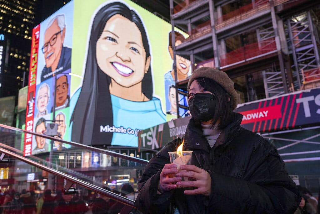 A January vigil at New York's Times Square in honor of Michelle Go. AP/Yuki Iwamura, file