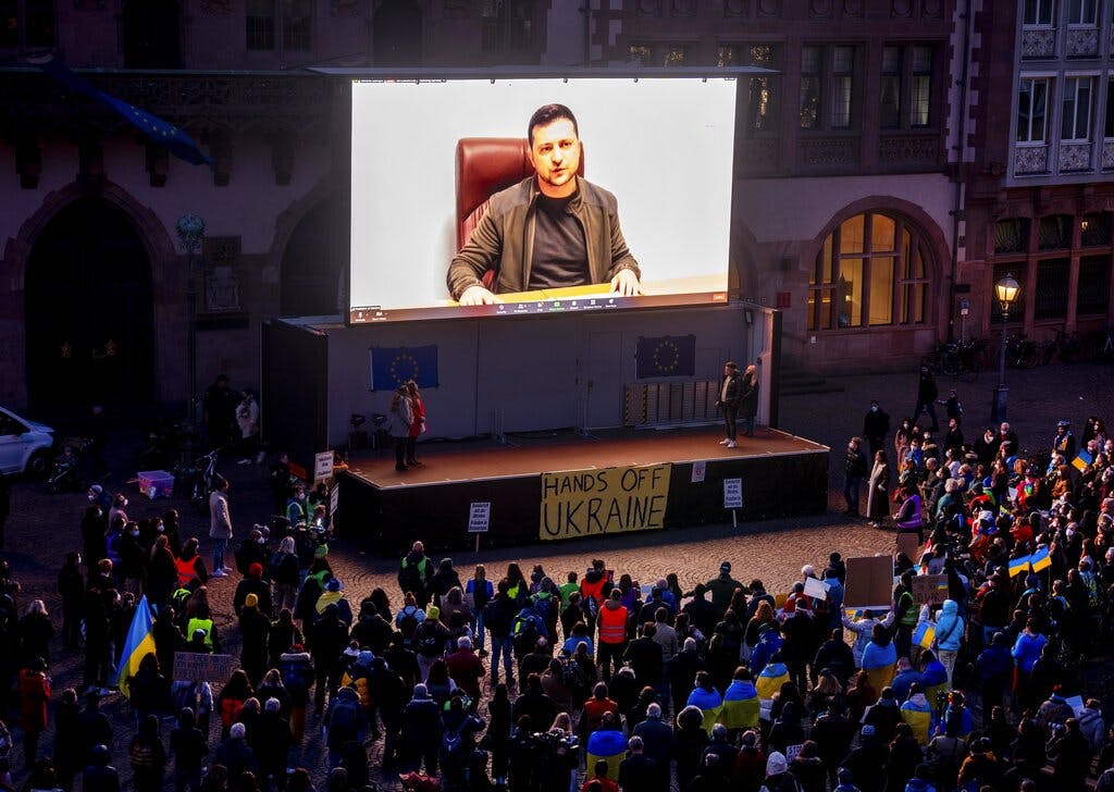 President Zelensky delivers a video message to the people joining a rally on the Remember square in Frankfurt, Germany, March 4, 2022. AP/Michael Probst, file