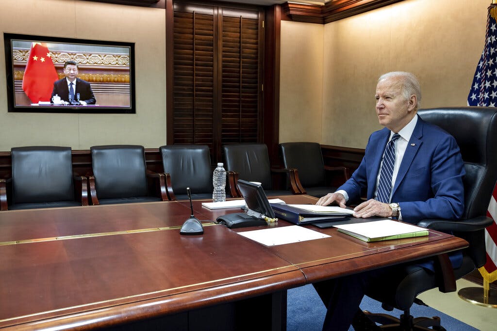 President Biden meets virtually from the Situation Room at the White House with President Xi March 18, 2022. The White House via AP