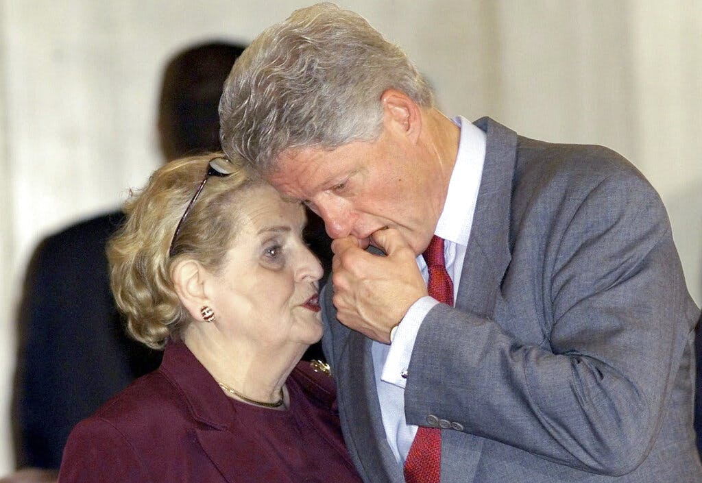 President Clinton confers with Secretary of State Albright in 2000. AP Photo/Jerome Delay, file