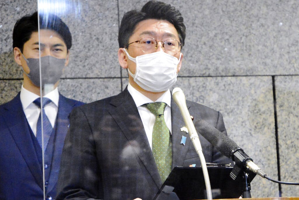 Japan’s deputy defense minister, Makoto Oniki, speaks to reporters at Tokyo March 24, 2022. Kyodo News via AP