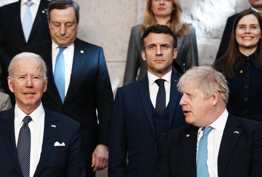 President Biden and Prime Minister Johnson are among the leaders at a group photo during an extraordinary NATO summit at Brussels, March 24, 2022. AP/Thibault Camus