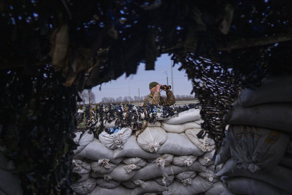 A Ukrainian soldier at a military check point. AP Photo/Rodrigo Abd, file