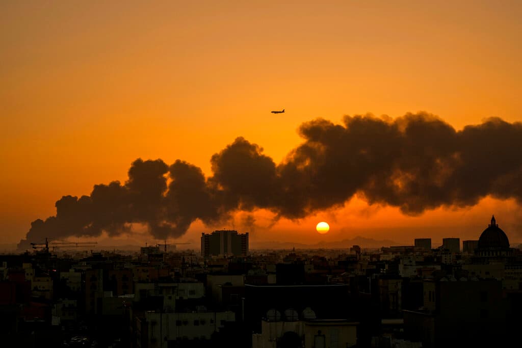 AP/Hassan Ammar Smoke from a fire at a Saudi Aramco oil depot after a Yemen Houthi rebel attack at Jiddah, Saudi Arabia, March 26, 2022.