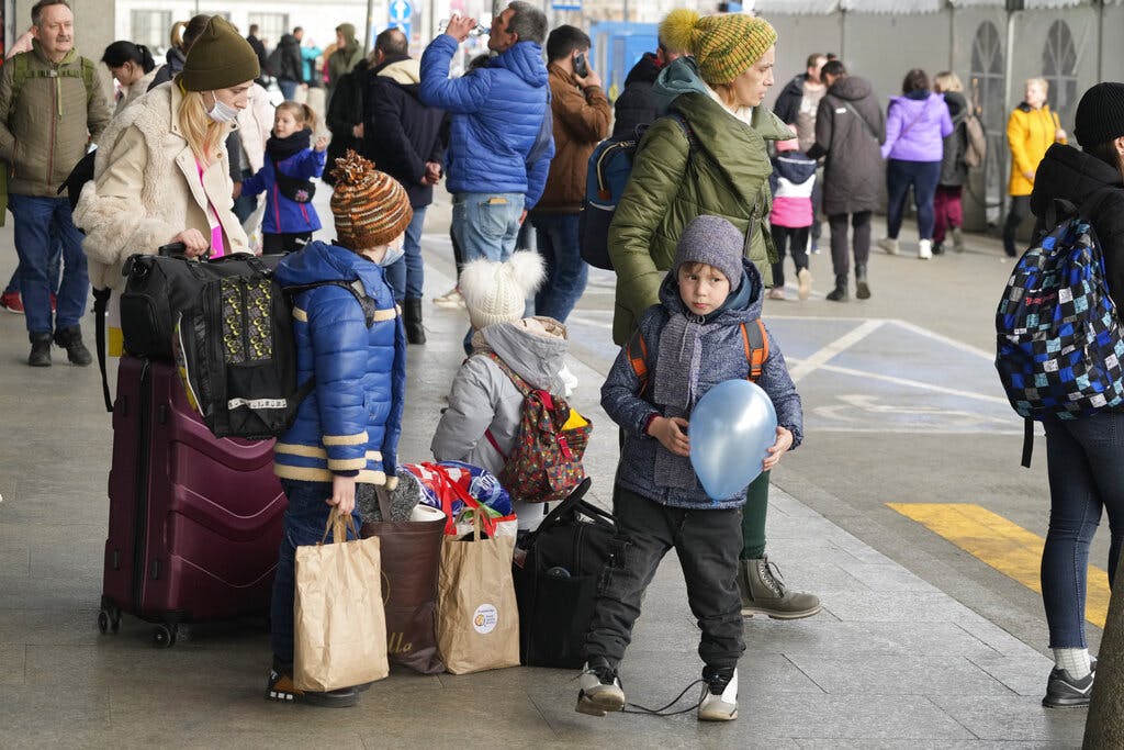 Ukrainian refugees at the central train station at Warsaw, Poland. AP Photo/Czarek Sokolowski