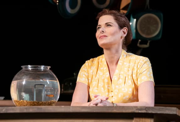 Debra Messing and goldfish in ‘Birthday Candles.’ Joan Marcus