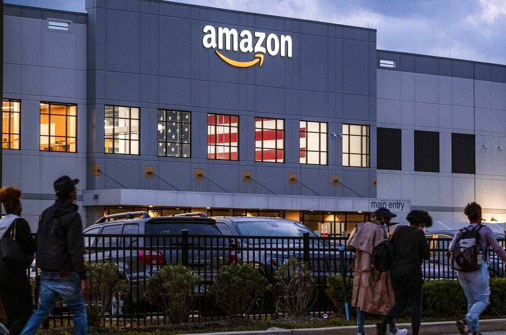 People arrive for work at the Amazon distribution center at Staten Island, October 25, 2021. AP/Craig Ruttle, file