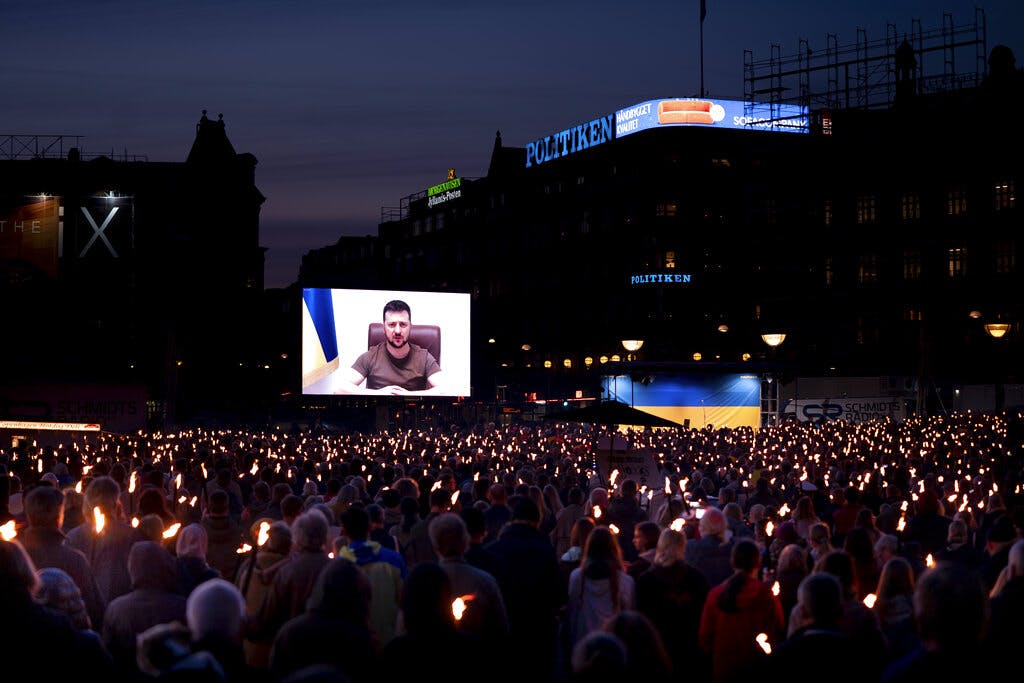 People gather to watch President Zelenskyy at the City Hall Square, Copenhagen, May 4, 2022. Liselotte Sabroe/Ritzau Scanpix via AP