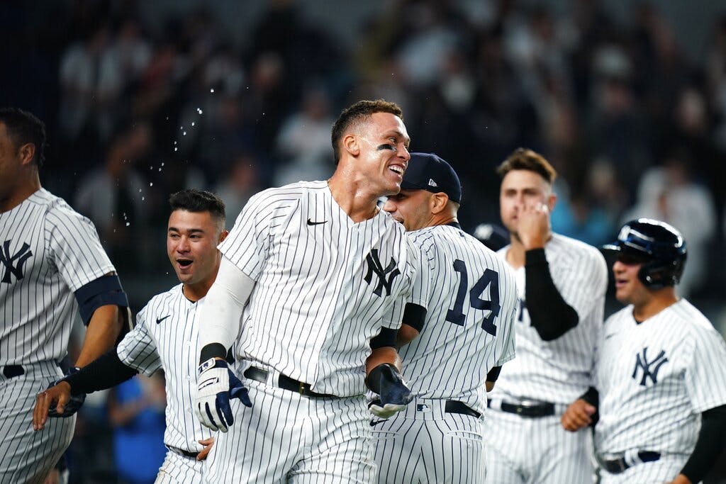 The Yankees' Aaron Judge celebrates with teammates after hitting a walk-off home run May 10, 2022. AP/Frank Franklin II