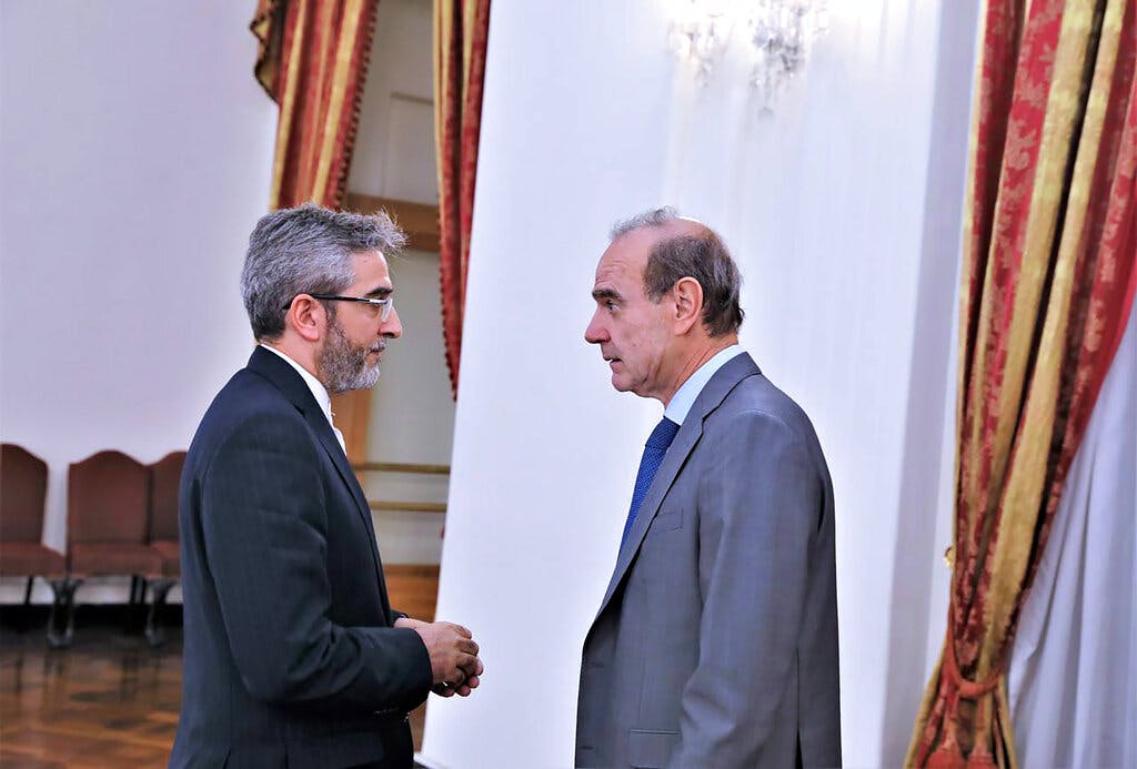 Iran's top nuclear negotiator Ali Bagheri Kani, left, and the European Union coordinator of talks to revive Iran's nuclear accord, Enrique Mora, May 11, 2022. Iranian Foreign Ministry via AP
