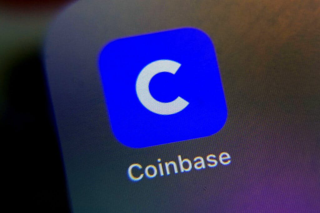 The mobile phone icon for the Coinbase app. AP/Richard Drew, file