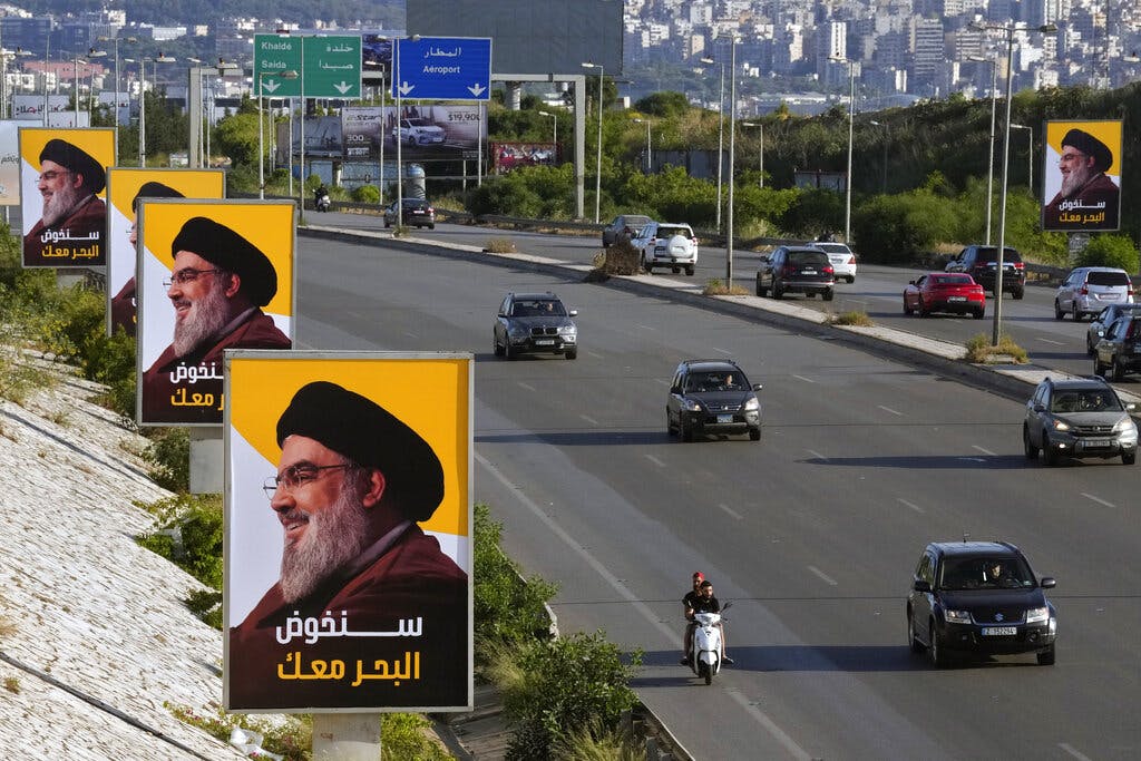 Posters featuring the Hezbollah leader, Sayyed Hassan Nasrallah, at Beirut May 10, 2022. AP/Bilal Hussein