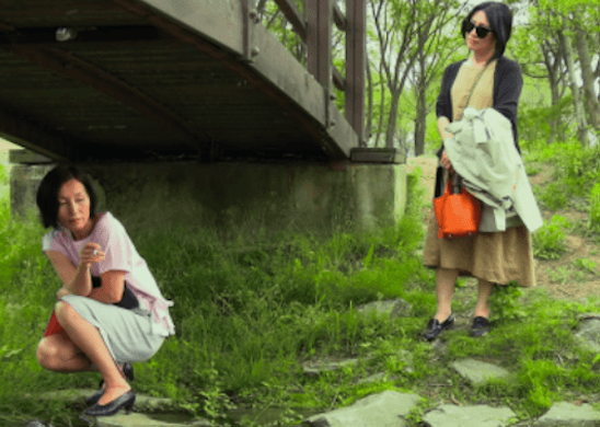 Lee Hyeyoung and Cho Yunhee in a still from ‘In Front of Your Face.’ Cinema Guild