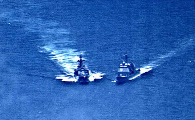 Detail of U.S. Navy photo via Wikipedia