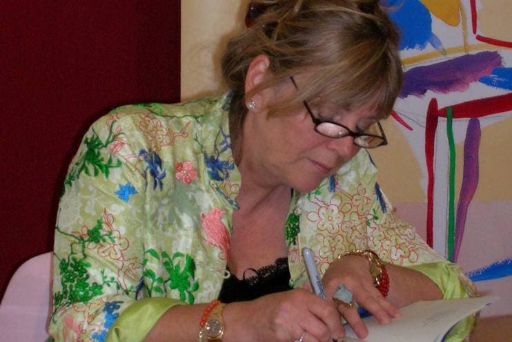 Tim Duncan via Creative Commons Kate Atkinson, signing books at the Edinburgh International Book Festival