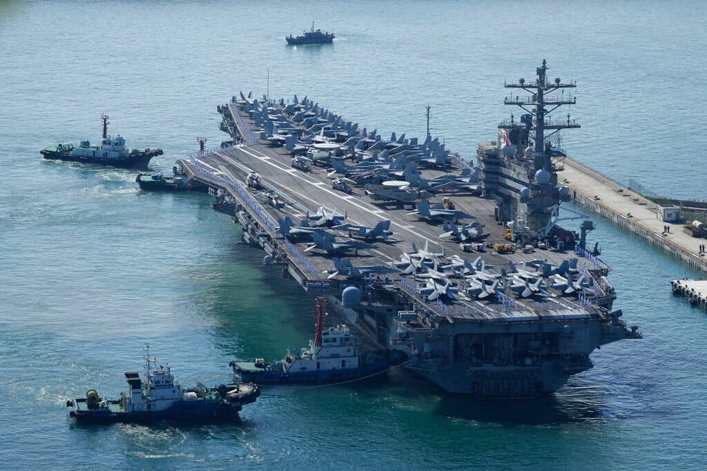 AP/Lee Jin-man The USS Ronald Reagan arrives at Busan, South Korea, September 23, 2022.
