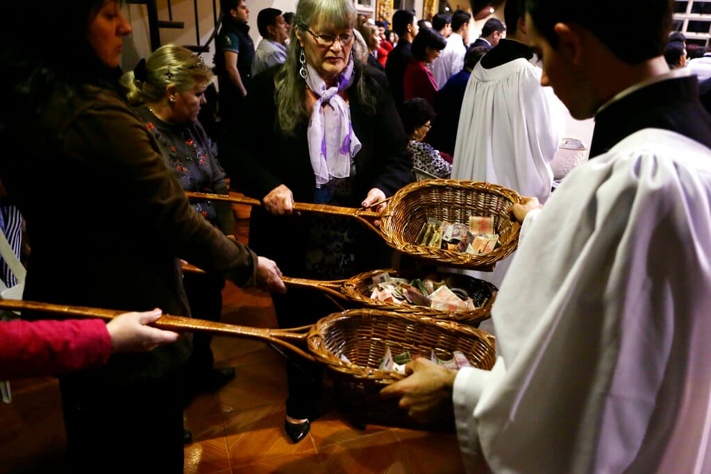 AP/Jorge Saenz Donations collected at the Espiritu Santo Catholic Church at Ciudad del Este, Paraguay, in 2015.