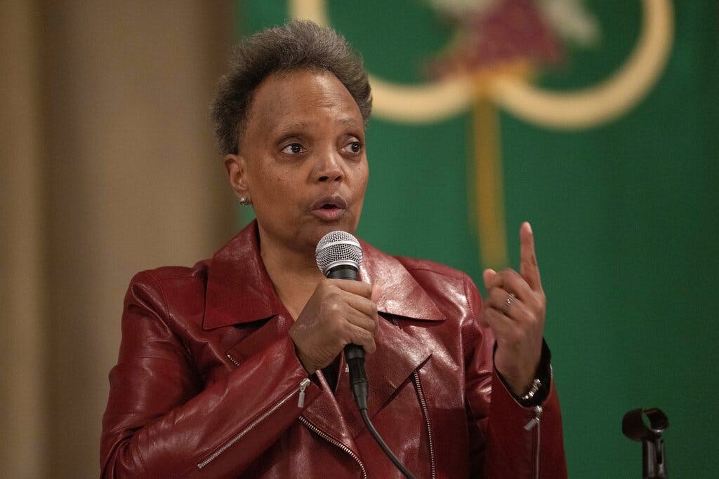 The mayor of Chicago, Lori Lightfoot, participates in a forum with other mayoral candidates at Chicago.