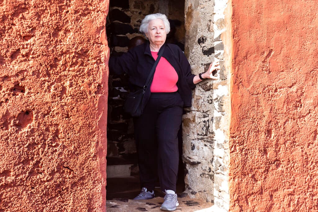 Treasury Secretary Yellen stands in the 'Door Of No Return' on Goree Island, Senegal, January 21, 2023.