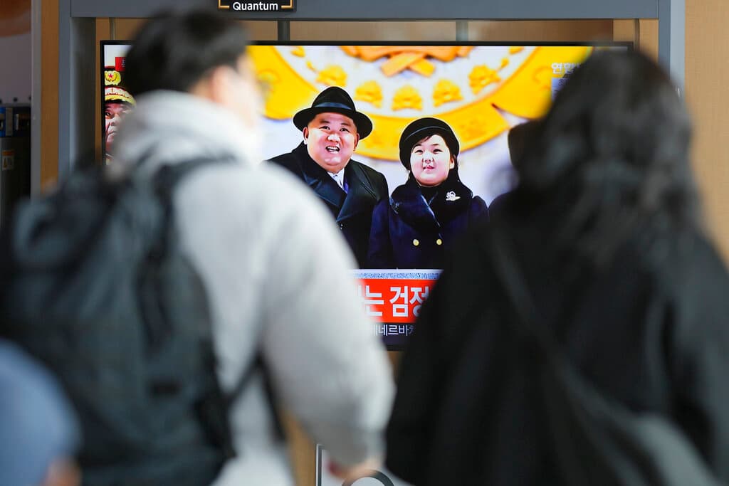 A TV screen at the Seoul Railway Station shows an image of the North Korean leader, Kim Jong-un, with his daughter February 9, 2023.