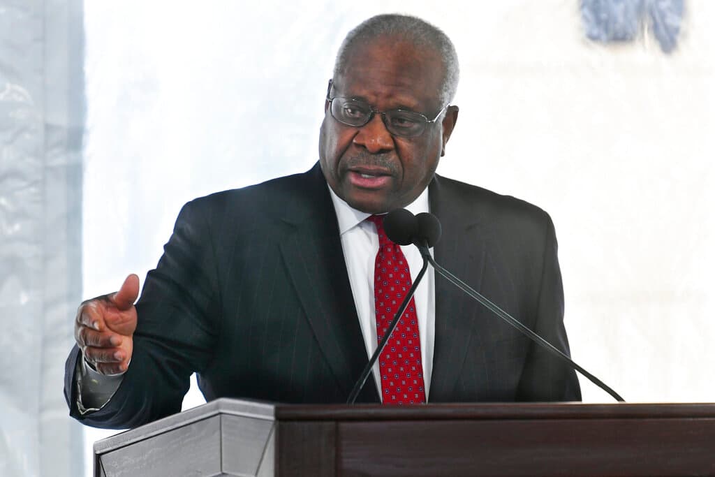 AP/John Amis, file Justice Clarence Thomas at Nathan Deal Judicial Center at Atlanta, February 11, 2020.