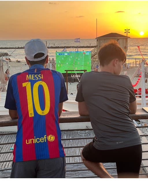 Benny Avni/NY Sun Fans watch the UEFA European Football Championship on a gigantic video screen at Tel Aviv, Israel, June 15, 2024.