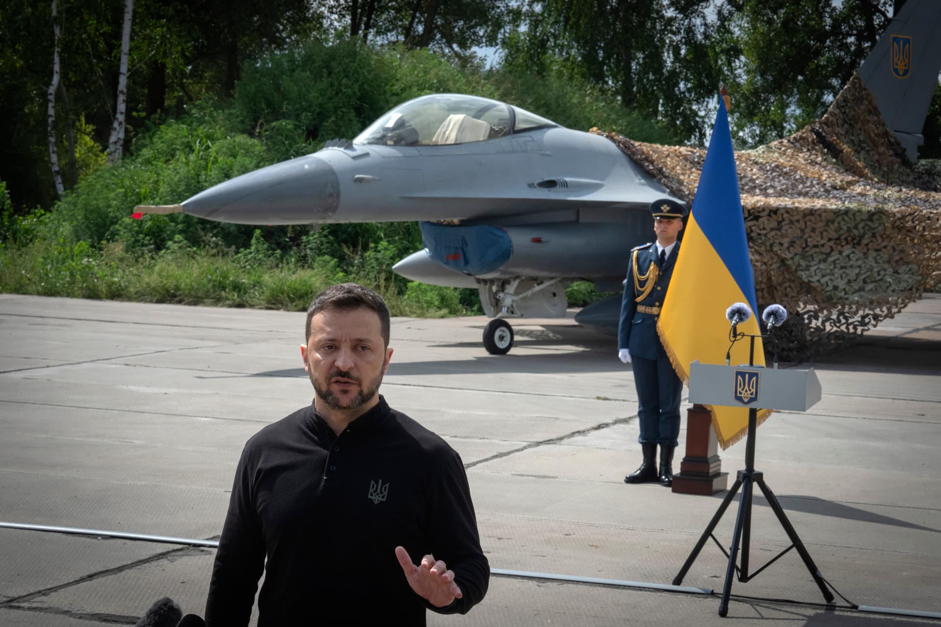AP/Efrem Lukatsky President Zelensky and a Ukraine Air Force F-16 fighter jet in the background on August 4, 2024.