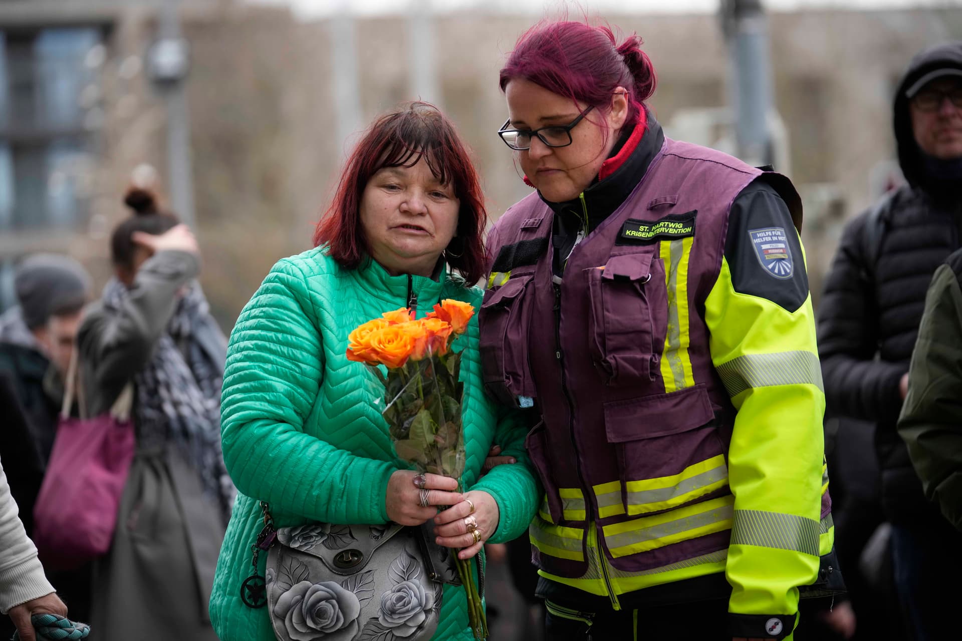 AP/Ebrahim Noorozi Mourners outside St. John's Church near a Christmas Market, where a car drove into a crowd, at Magdeburg, Germany, December 21, 2024.