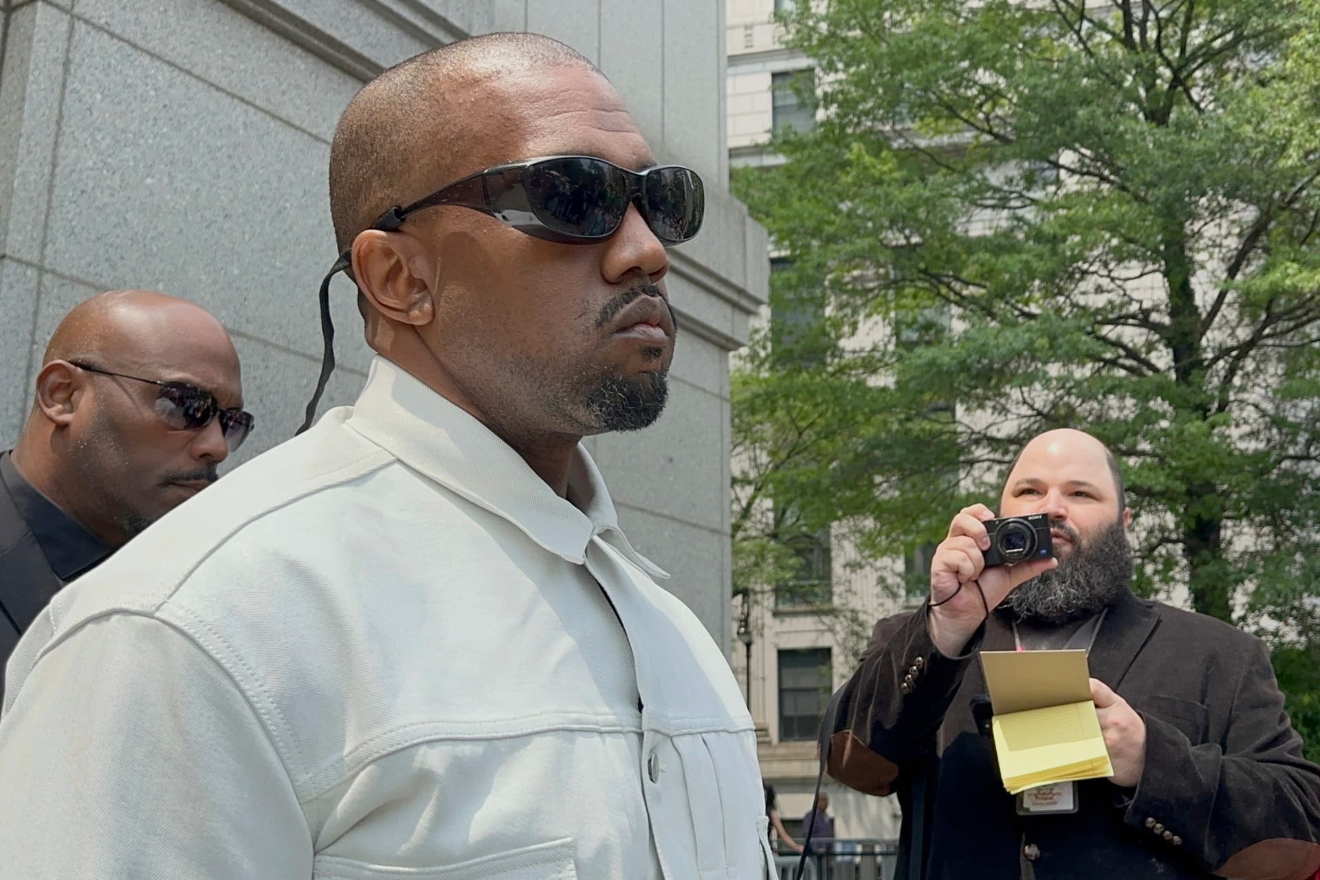 AP Photo/Larry Neumeister Ye, the rapper formerly known as Kanye West, leaves federal court during the trial of Sean 'Diddy' Combs in New York, Friday, June 13, 2025.