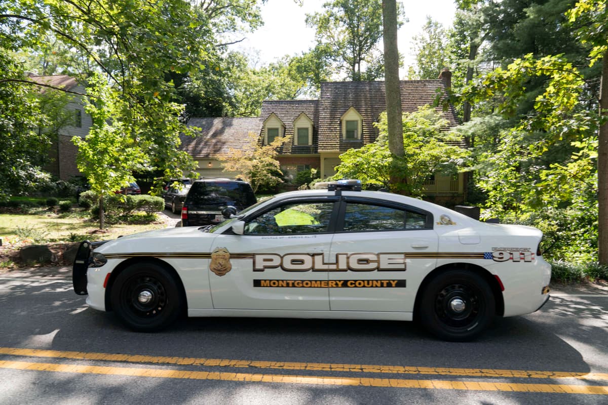 Montgomery county police patrol John Bolton's home as FBI agents search the house in Bethesda Md, Friday, August. 22, 2025. (AP Photo/Jose Luis Magana) The New York Sun