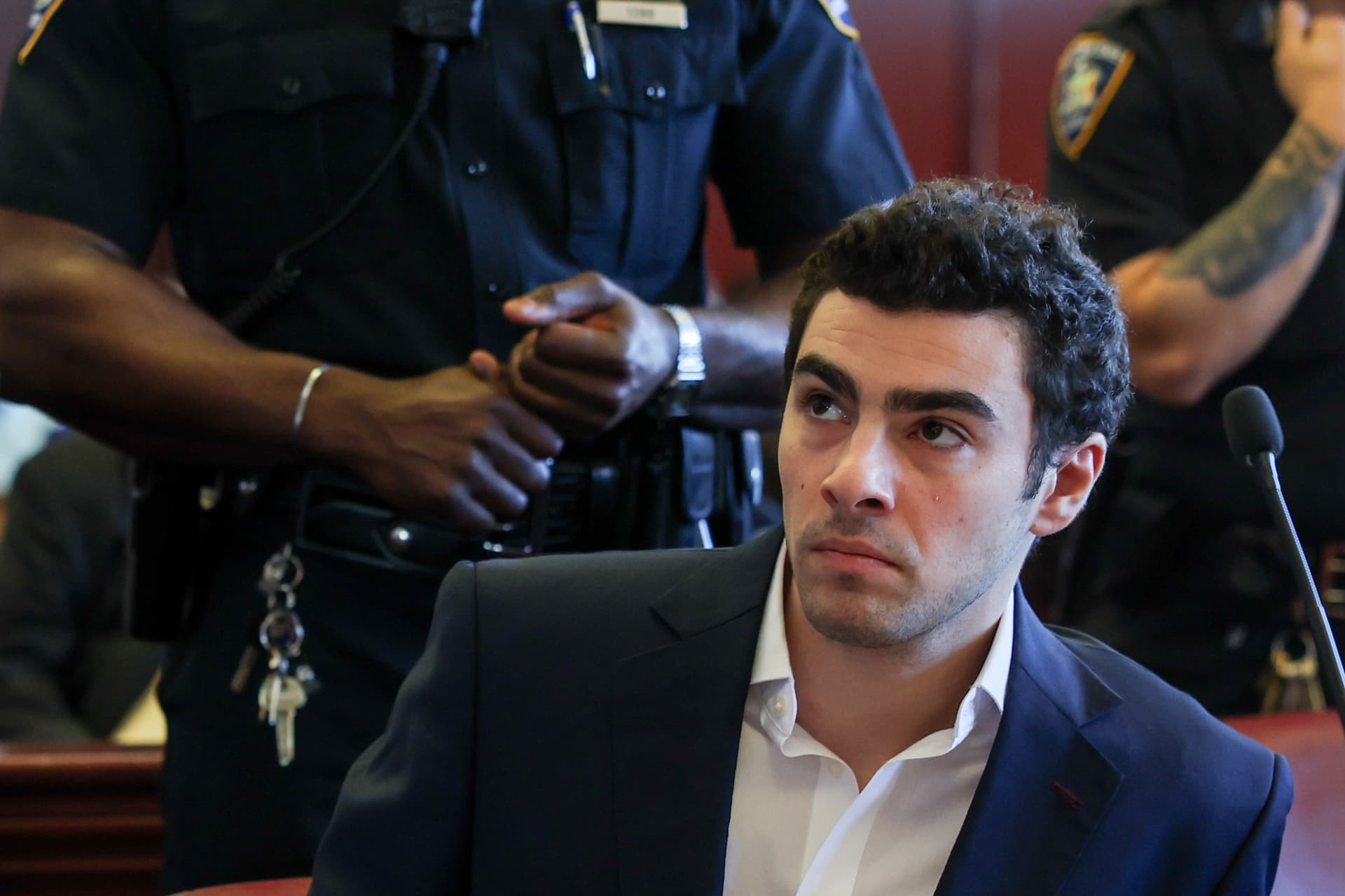 Shannon Stapleton-Pool/Getty Images Luigi Mangione attends a suppression of evidence hearing in the killing of UnitedHealthcare CEO Brian Thompson in Manhattan Criminal Court on December 18, 2025, at New York City.