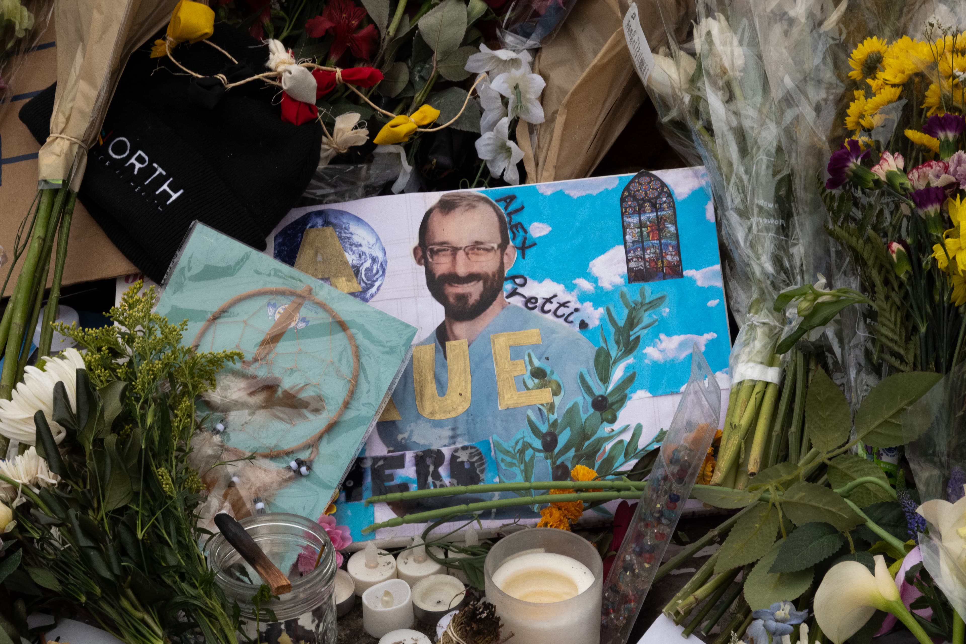 Mourners visit a memorial to Alex Pretti on January 26, 2026. Mourners visit a memorial to Alex Pretti on January 26, 2026.