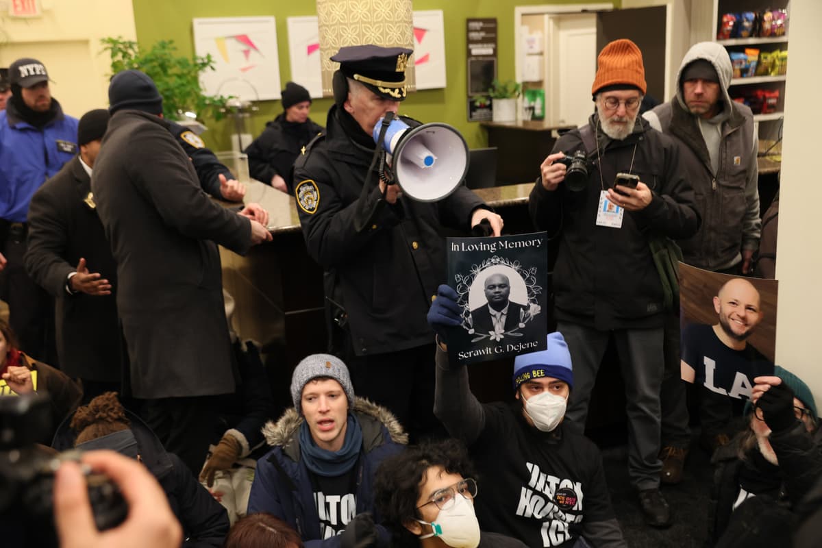 Michael M. Santiago/Getty Images NYPD gives an order to leave or be arrested as immigration rights activists stage a sit-in at the Hilton Garden Inn on January 27, 2026. Various human rights organizations and immigration rights activists took over the lobby of the hotel where Immigration and Customs Enforcement (ICE) agents are reportedly staying.