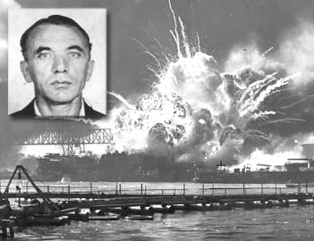 Via Wikimedia Commons Otto Kuehn’s FBI mugshot is superimposed over an image of an explosion aboard the USS Shaw at Pearl Harbor on December 7, 1941.