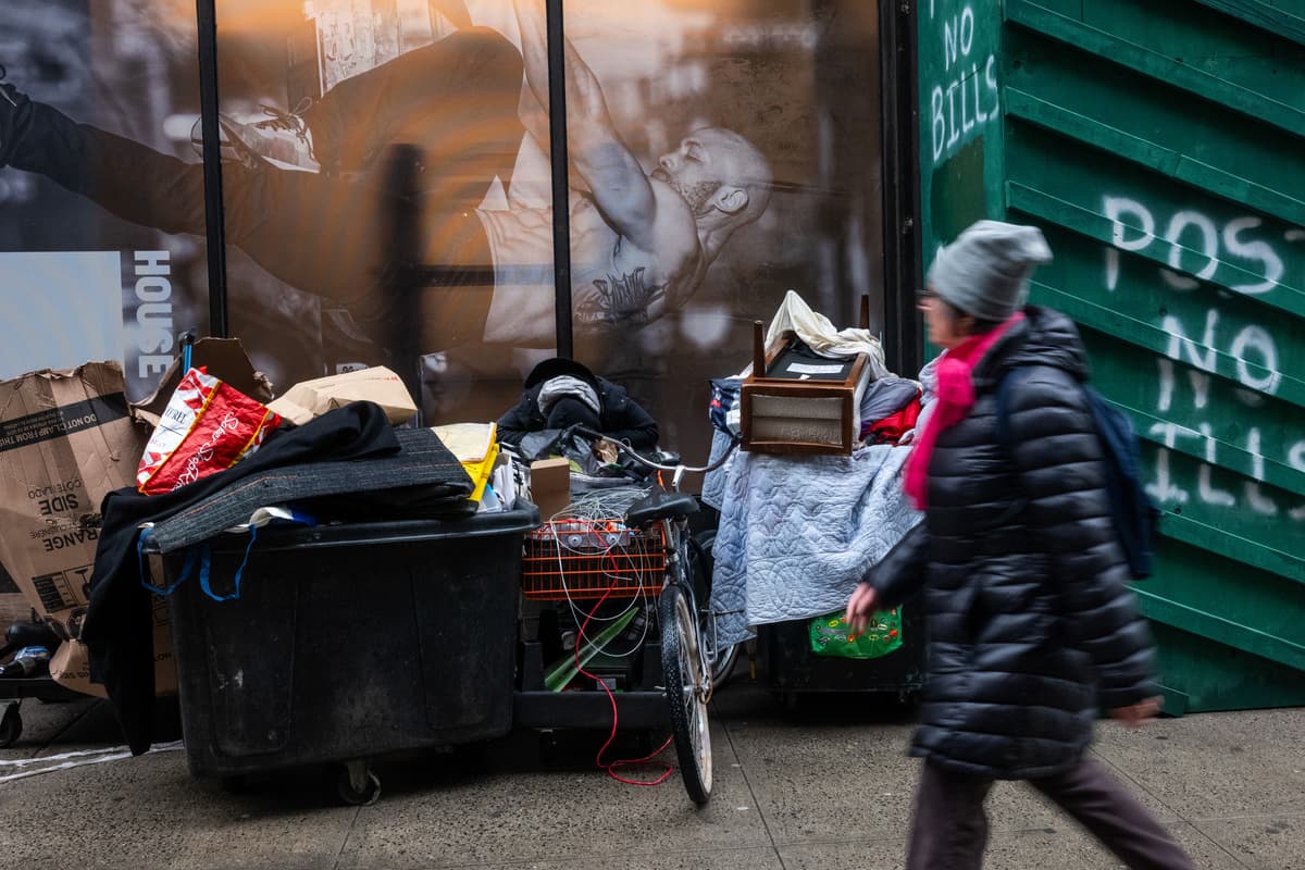 Spencer Platt/Getty Images A homeless person on the street at Manhattan on December 29, 2025.
