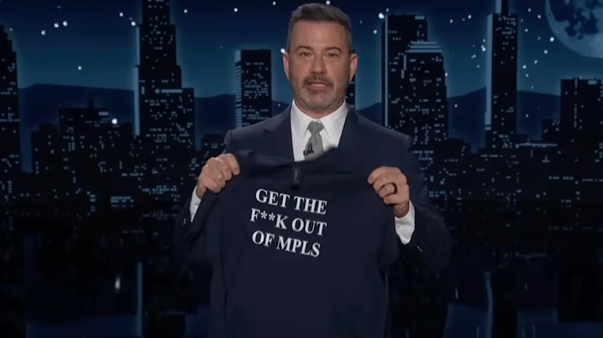 ABC Jimmy Kimmel holds up an anti-Trump t-shirt during a January 7, 2026, episode of his eponymous program.