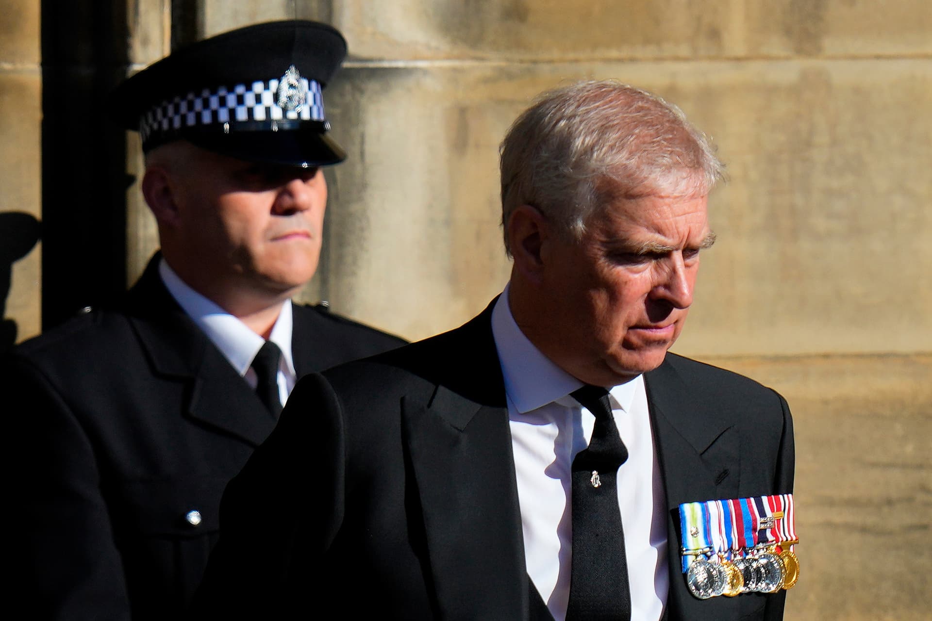 AP/Petr David Josek Andrew Mountbatten-Windsor leaves St. Giles Cathedral after the arrival of the coffin containing the remains of his mother Queen Elizabeth, at Edinburgh, Scotland, Sept. 12, 2022.